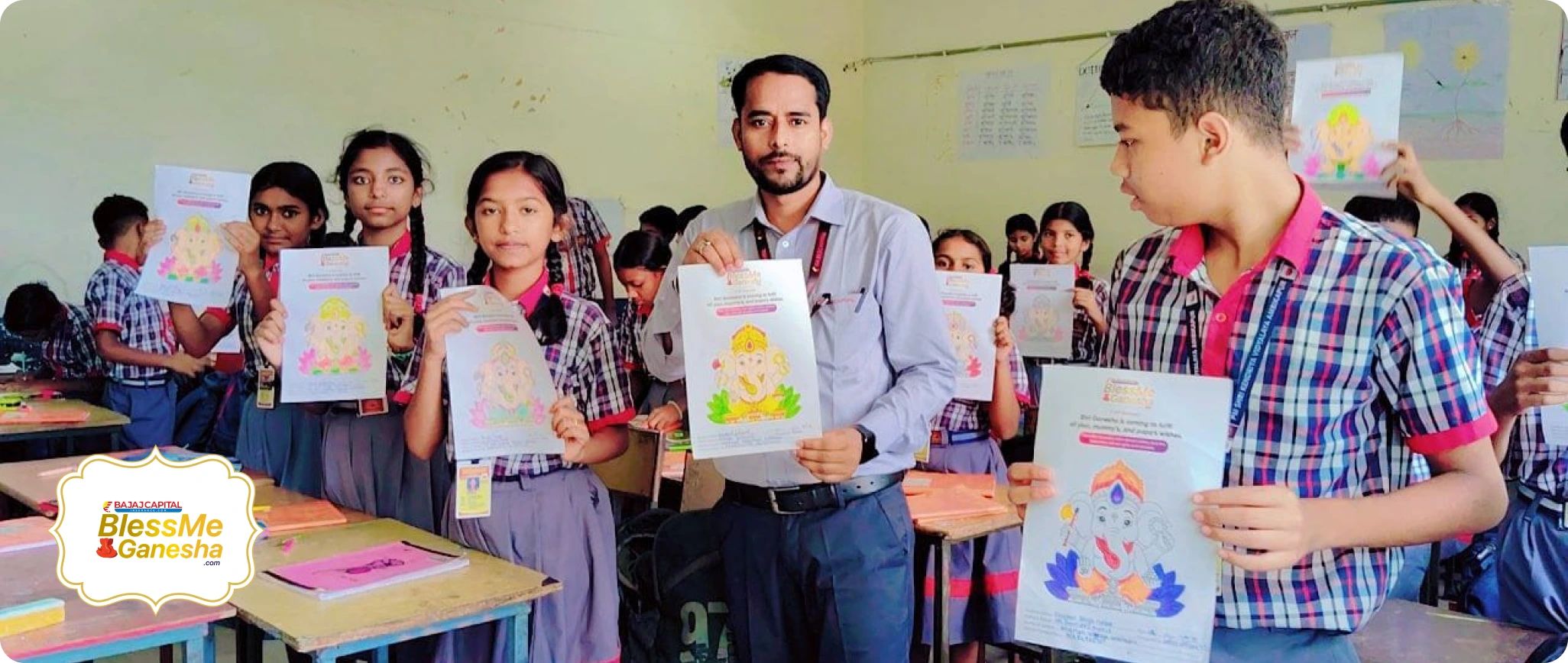 Students showing Ganesha drawings during the previous edition